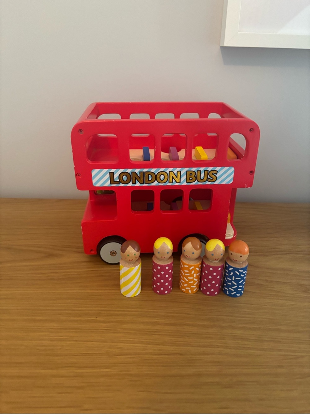 Red London Bus Wooden Toy with Colorful Peg Passengers